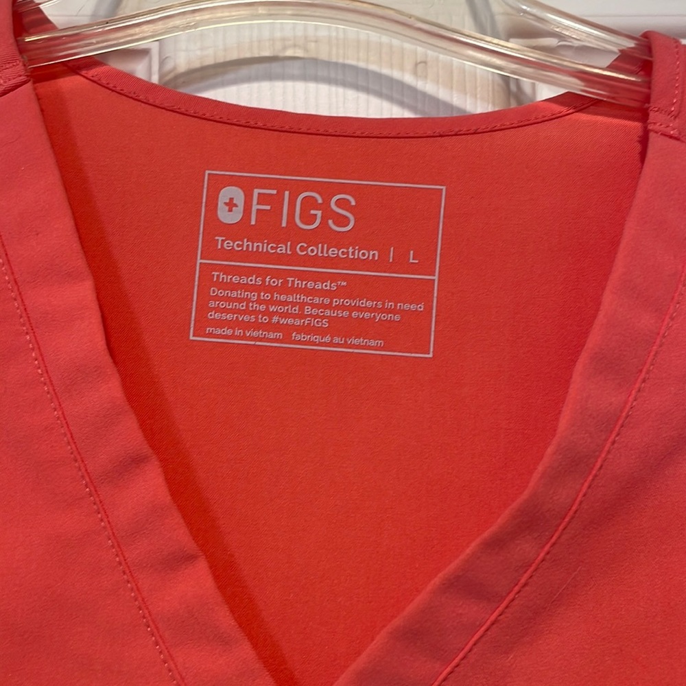 Beautiful limited edition hot coral! Worn once. Washed. Like brand new!